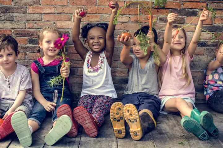 Kids Holding Plants