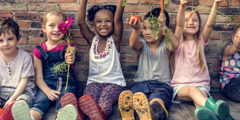 Kids Holding Plants